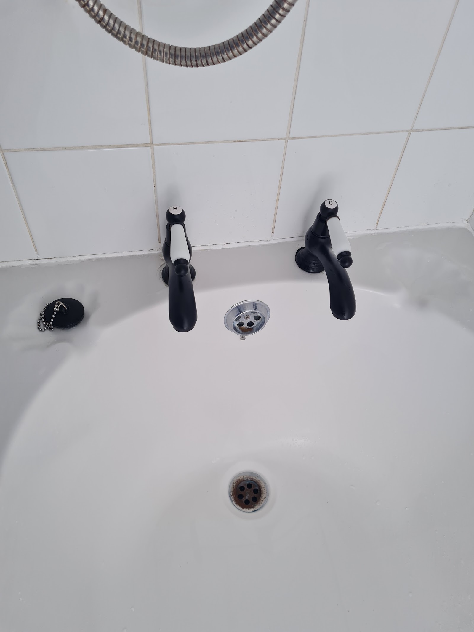 New black basin taps fitted by AbbeyCliffe Plumbing